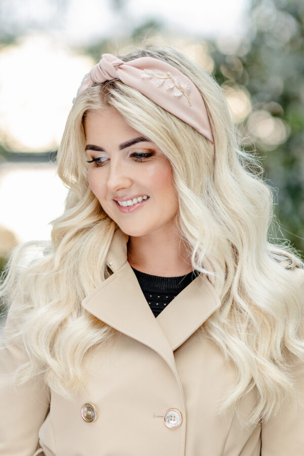 Blonde woman wearing knotted headband